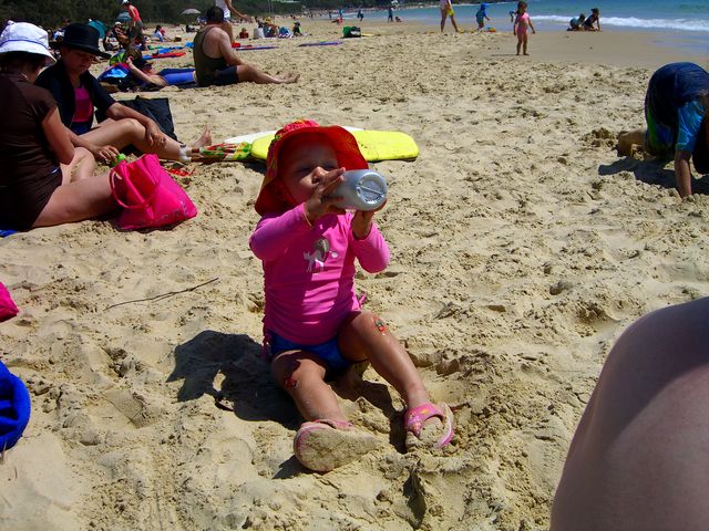 21 - Neve enjoying a drink at the beach