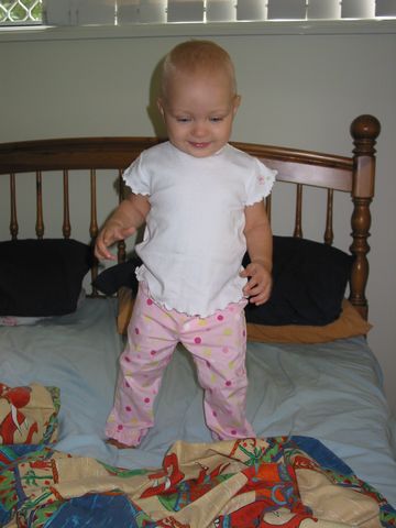 13 - On mum and dads bed wearing my new clothes