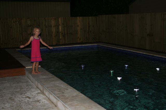 14 - Neve and the very cool solar pool lights
