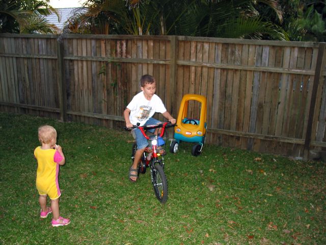 7 - Patrick showing off his bike skills to Neve